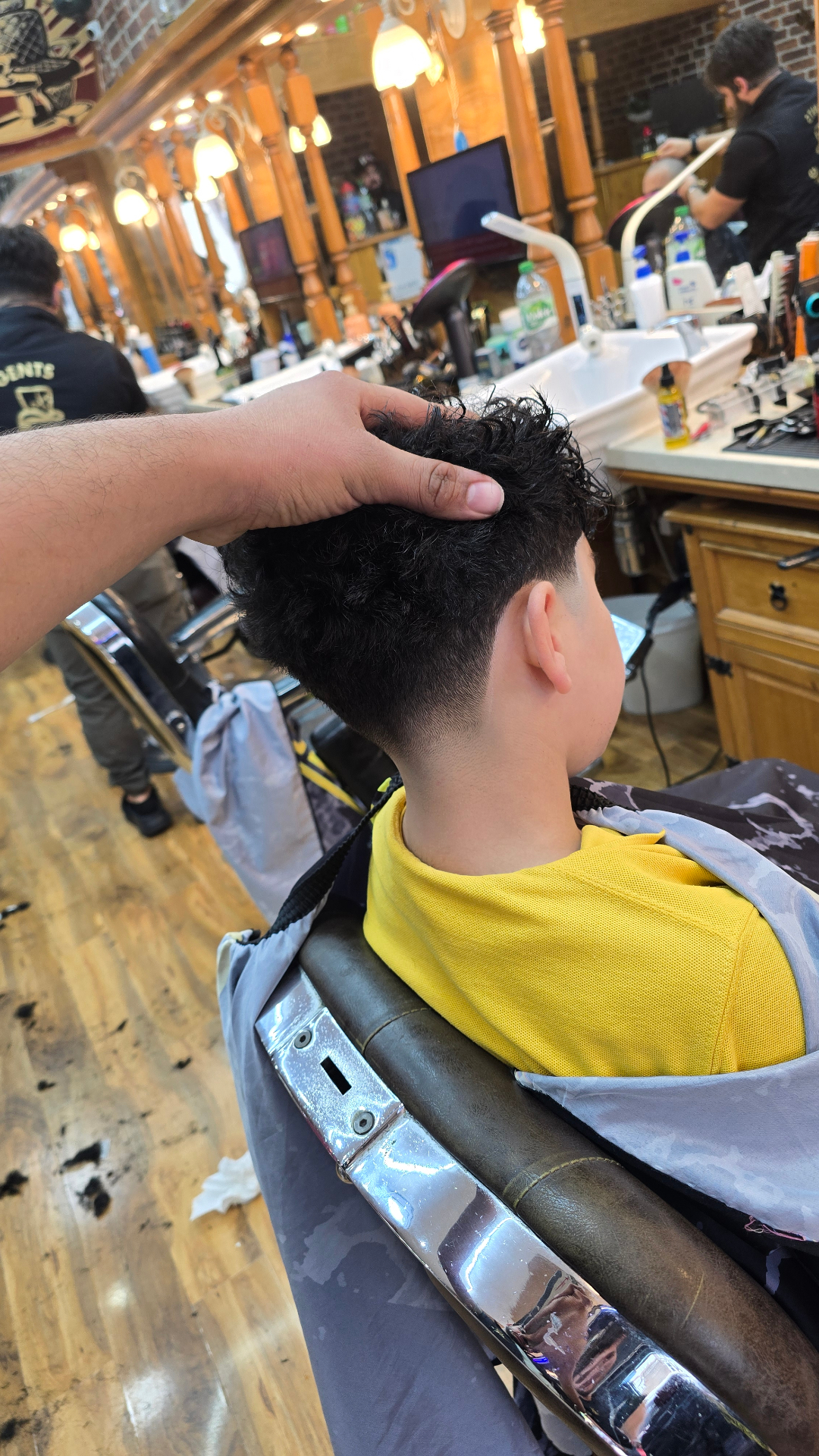 Textured kids haircut with taper fade